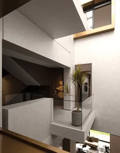 Modern interior space featuring concrete walls and flooring.