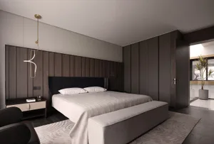 Modern minimalist bedroom with a cozy bench, minimalist design details, and a light wood headboard.
