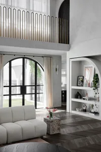 Modern living room with concrete walls, glass accents, and a sleek, contemporary design.