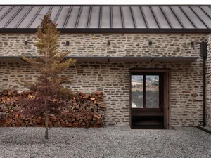 A stone building with an industrial exterior.