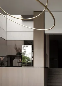 Contemporary office space featuring layered metal and wood structures.