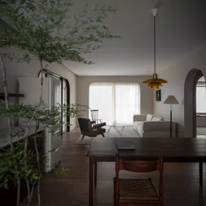 Modern residential interior featuring a living room with wooden furniture and textile accents