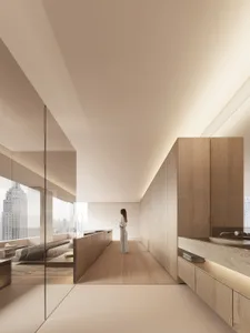 A minimalist bedroom featuring wooden cabinets and flooring, overlooking a cityscape.