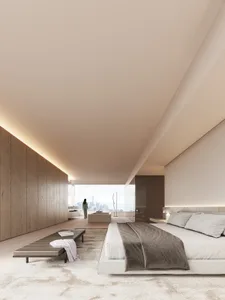 Modern bedroom suite featuring a cozy bed with a gray and white duvet, a wooden bench on a beige rug, and a contemporary ligh