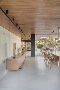 Modern commercial space featuring wooden and concrete elements