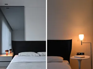 Bedroom with a minimalist design featuring neutral materials and a modern aesthetic.