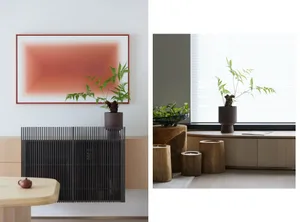 A minimalist interior design featuring modern wooden and metal furniture and decor elements.