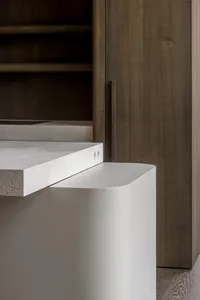 A modern interior space featuring sleek concrete details.