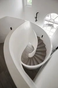 Modern staircase with white walls and wooden steps