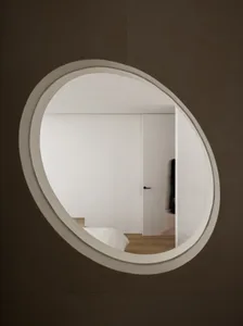 Minimalist interior space with a window featuring concrete material
