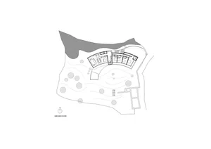Black and white architectural plan of a house's ground floor with rooms labeled and dimensions indicated.