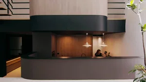 A modern office space featuring geometric concrete design elements