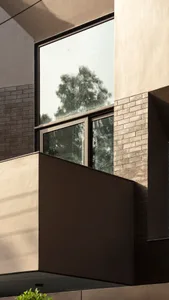 A modern architectural design with a large glass window.