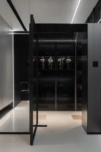 Industrial-style corridor with glass and steel elements