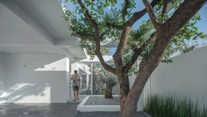 A minimalist interior design featuring stone elements.