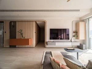 Modern living room featuring wooden walls and furniture