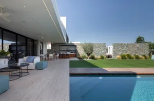 Modern architectural interior with concrete and stone materials.