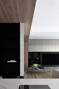 Modern interior design featuring marble elements in a living room setting.