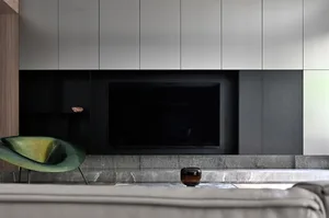 Modern living room featuring marble flooring and minimalist design.