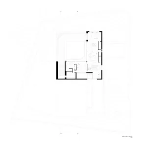 A 2D architectural drawing of a modern residential floor plan, featuring open spaces and a central courtyard.
