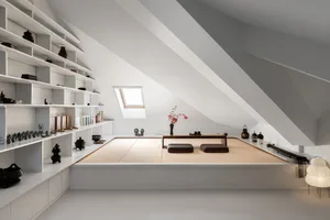 A minimalist living space with white walls, wooden accents, and a tatami-style floor.