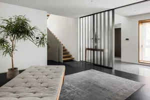 Modern, minimalist interior design featuring sleek, metal accents.