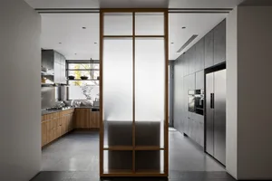 Contemporary kitchen interior with modern materials and design.