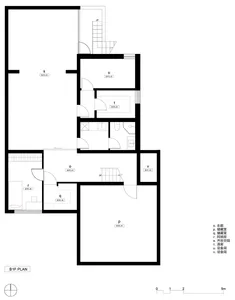 A black-and-white architectural floor plan of a modern row house's ground floor, with labeled rooms and walkways.