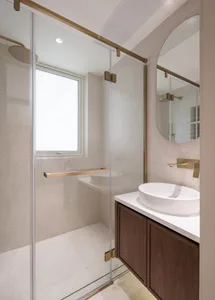 Modern bathroom featuring minimalist design and granite surfaces.
