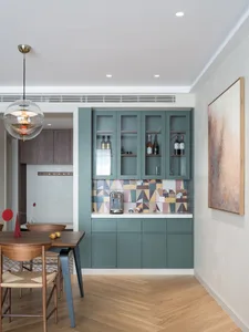 Modern kitchen with wood, concrete, and tile elements.