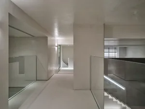Modern minimalist corridor with concrete and glass materials