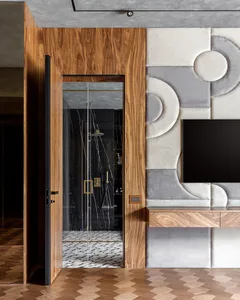 Modern bathroom with a wooden wall, marble tiles, and glass shower enclosure