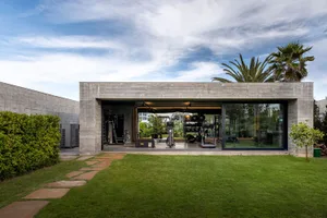 Modern outdoor gym with concrete structure and lawn