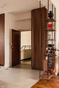An elegant, modern entryway with wooden elements and a stylish design.