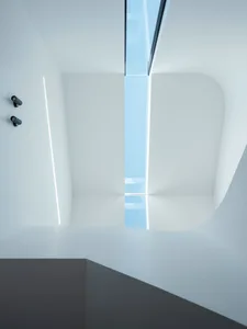 Modern interior with glass walls and ceiling.