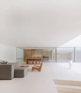 Large white marble living space with minimalist design
