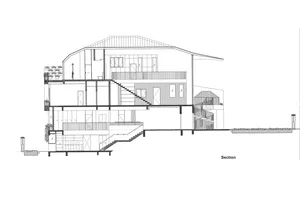 現代住宅的詳細建築剖面圖，展現混凝土、木材與玻璃材質。