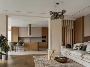Modern minimalist living room with wooden elements, marble finishes, and metallic accents.