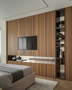 A minimalist bedroom with a brown paneled wall, a white bed with a gray blanket, and a floor-to-ceiling shelf with decorative