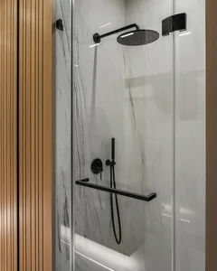 Modern bathroom shower with marble tiles and black steel fixtures