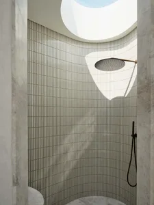 Modern bathroom with marble and glass materials