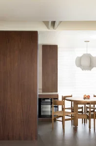 Modern interior design featuring wooden furniture and fixtures.