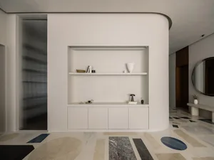 Modern minimalist living room with concrete and marble elements