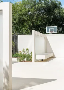Modern swimming pool house featuring minimalist white concrete architecture