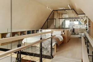 Modern minimalist bedroom featuring wood and glass materials.