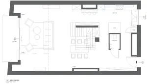A minimalist residential floor plan featuring a living room, kitchen, and bathroom.