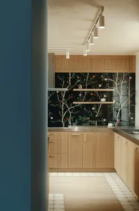 Contemporary residential kitchen featuring wooden cabinets, glass backsplash, and minimalistic design