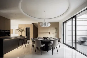 A modern interior design featuring a dining table with white marble top and black legs surrounded by white chairs, set up wit