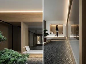 A modern minimalist interior design featuring wood elements and a gravel courtyard.