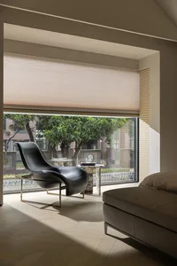 Contemporary residential interior with a wood floorplan and modern furniture.